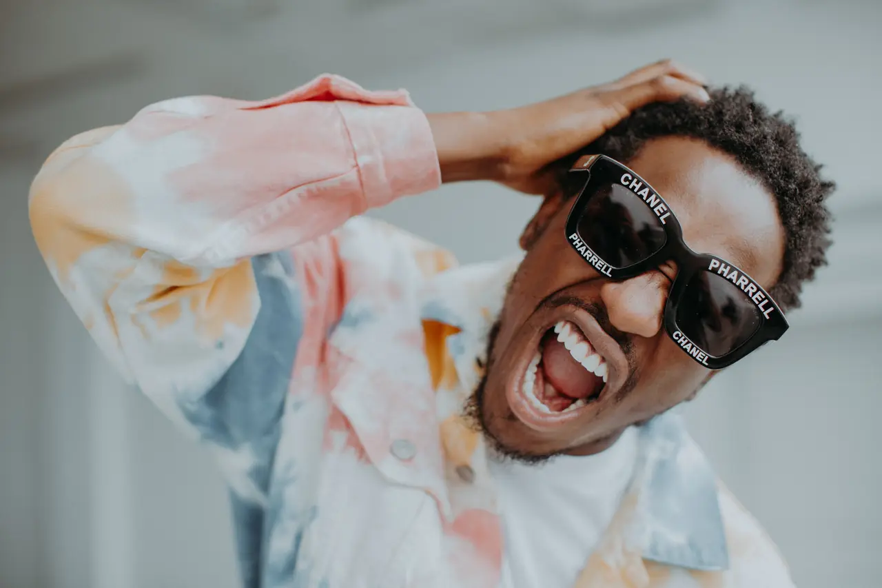 Streetwear portrait, tie-dye and shades